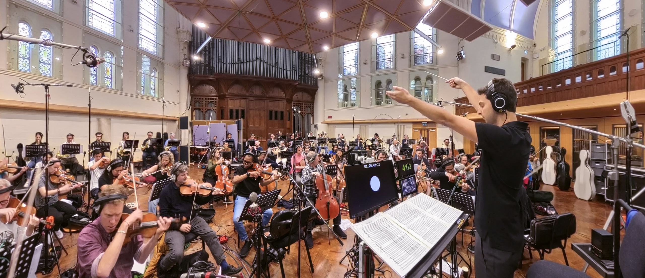 Stephen conducting orchestra playing his piece